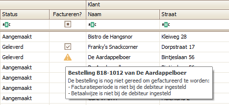 De kolom Factureren? met een waarschuwingsicoon en uitleg waarom een bestelling nog niet gefactureerd kan worden